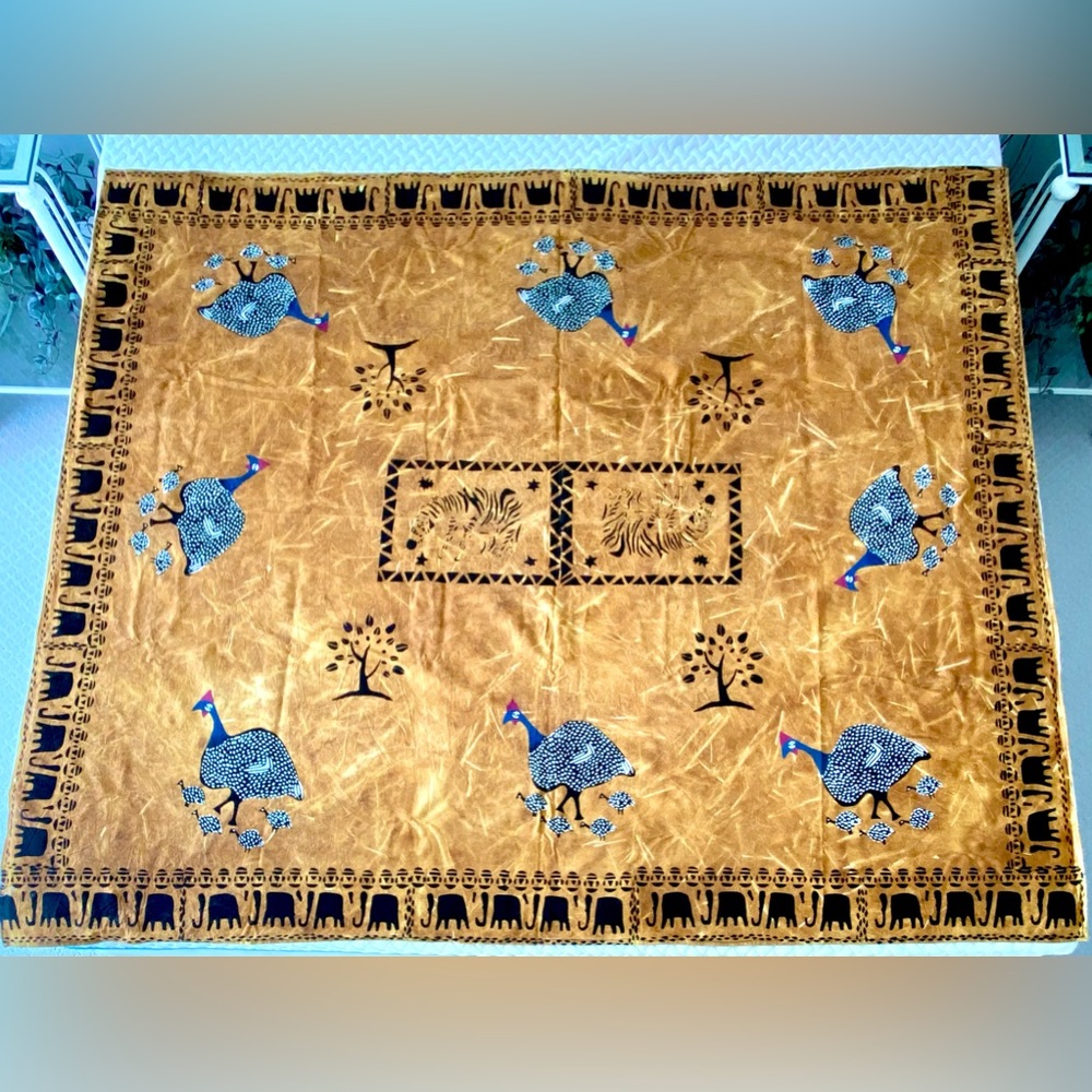 New from South Africa hand decorated table cloth with bird and elephant design.
